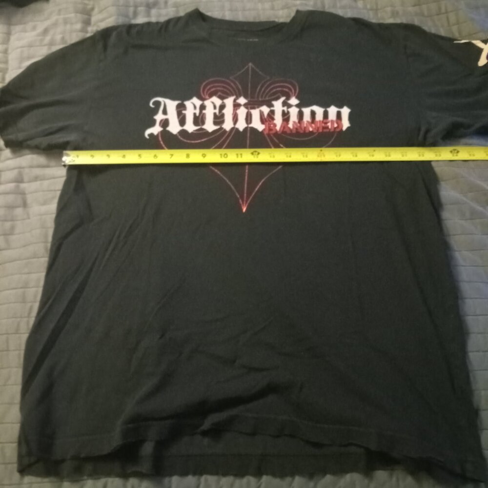 Two affliction t shirts